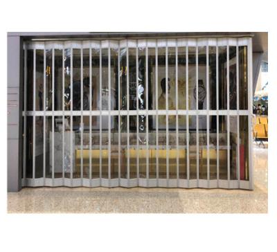 China Good quality heat insulation sliding polycarbonate Crystal Folding Door /auto store plastic folding shutter door for sale