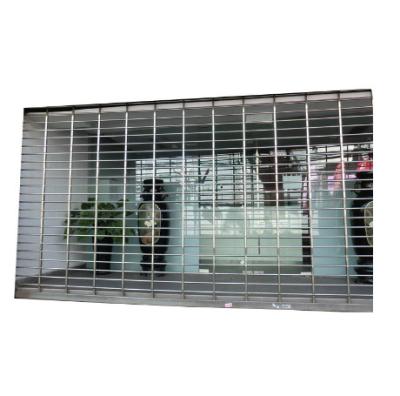 China Safe Ensuring Anti Theft And Stable High Quality Stainless Steel Security Roller Shutter Door for sale