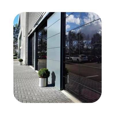 China Customized Modern High Quality Anti-theft Glass Panel Gass Garage Automatic Electric Door for sale