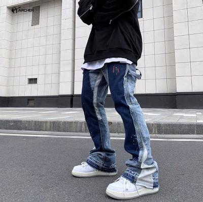 China Breathable High Quality Blue Patchwork Painted Cargo Jeans With Pockets Black Rock Blue Revival Jeans Designer Denim Flared Jeans Men for sale