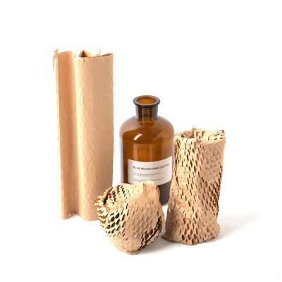 China Recycled Materials Honeycomb Cushioning Paper Kraft Package Perforated Kraft Roll Fully Recyclable For Packaging for sale