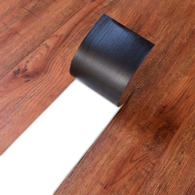 China Modern Indoor Waterproof PVC Wood Vinyl Grain Factory Price Floor Tiles Self Adhesive Diy Plastic Flooring for sale