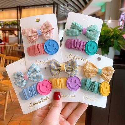 China Hair Claw Clips One Pair Cotton Fabric Bow Hair Clips Wave Water Drop With Smile Face Design Hair Clips For Girls for sale