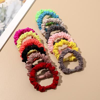 China 2022 Spring Summer Bright Color Small Scrunchies Friendly Material Rubber Elastic Hair Ties For Girls for sale