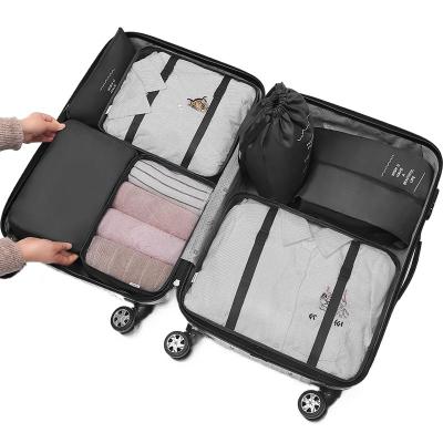 China Durable Travel Packaging Cubes Custom Logo Travel Suitcase Storage Bag 7pcs Newcomer Travel Storage Bag Set Travel Storage Pouch Makeup Bag for sale