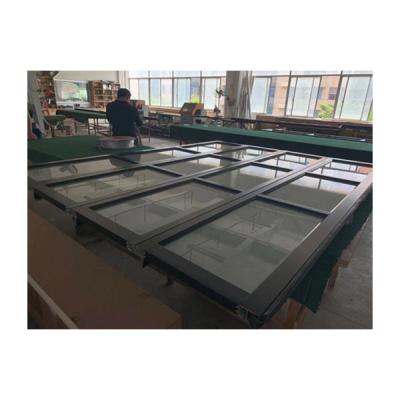 China Modern Hot Selling Automatic Aluminum Overhead Sectional Design Garage Glass Door For Housing for sale