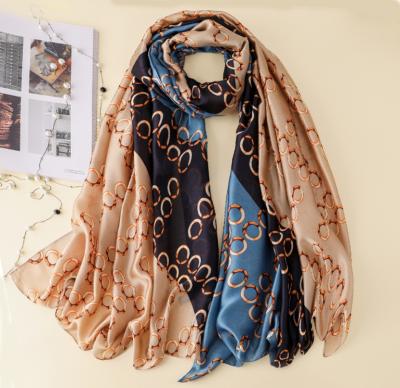 China Polyester Fashion Contrast Color Pom Pom Printed Long Scarf Women Head Shawl Scarf for sale