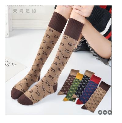 China Fashion Women Girl Letter Breathable Knee Boots Shiny Trend Gold Silver Yarn Cotton Socks for sale