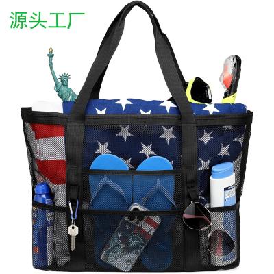 China Lightweight and durable amazon hot selling black beach bag durable mesh material 8 pockets toy storage bag 45 L large capacity sturdy mesh cutout bag for sale