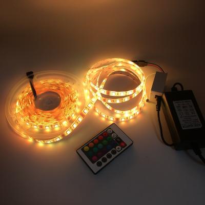 China Indoor and Outdoor 12V RGB LED Decorative Lighting with Power Adapter IP65 5050 5M LED RGB SMD LED Infrared Remote Control Waterproof Strip Light for sale