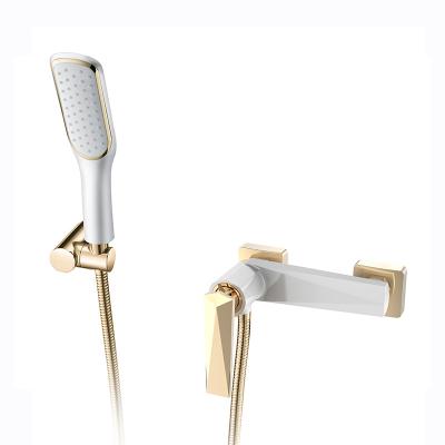 China Without Slide Bar Design Luxury Style White And Gold Shower Bath Wall Mounted Faucet for sale