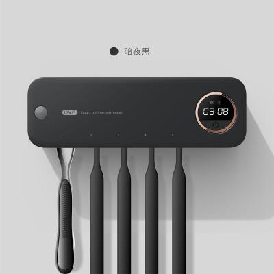 China 60 Times 2022 New Fate UV-C Toothbrush Sterilizer with Smart Clock Digital Display and Human Body Sensor for sale