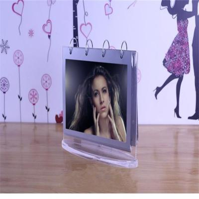 China Eco - Friendly Custom Acrylic Clear Table Calendar With Oval Base Paging Photo Frame for sale