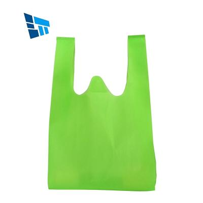 China Eco-Friendly T-shirt Bags PP Spunbond HDPE Roll Non-woven Colorful T-shirt Bag Handled Compostable T-shirt and T-shirt Waste Bags for Supermarket for sale