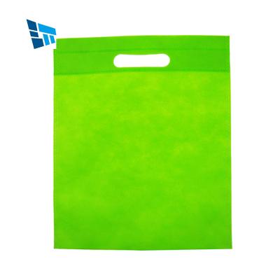 China PUNCH Nonwoven PP D-Cut Free Sample 70gsm Cheap Spunbond Fabric Die Cut Blue Nonwoven T Draw String Garment Bag for sale