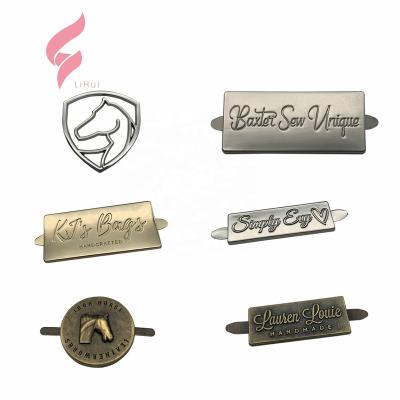 China Customized Brand Metallic Logo Metal Tag Accessories Fashion Alloy Metal Plates Custom Brand Logo Labels For Handbags for sale