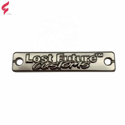 China Direct Sustainable Factory Provide Custom Logo Metal Embossed Swimwear Metal Logo Label Tags For Apparel/Hat/Handbags/Shoes for sale