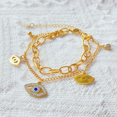 China Other Wholesale Fashion Women Jewelry 18K Gold Plated Evil Eye Bangle Stainless Steel Pendant Bracelet Multilayer for sale