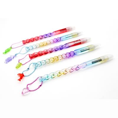 China Creative Creative Modeling Student Cute Promotional Twist Ballpoint Pen With Pendant Advertising Pen Colorful Gradient Gift Pen for sale