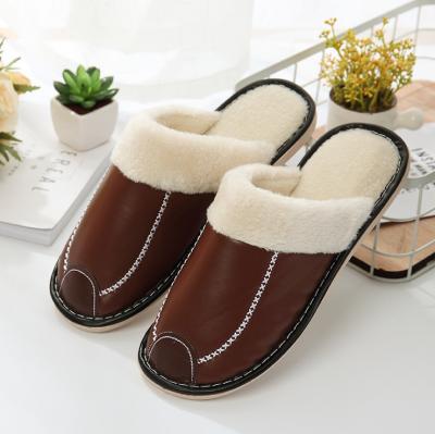 China Indoor PU Leather Winter Cotton Couples Waterproof Slippers Men's Non-slip Warm Slippers for sale