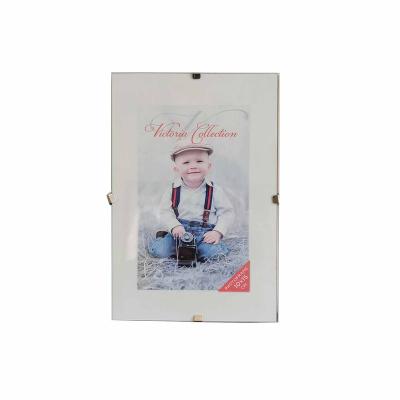 China Home deco wholesale cheap clip 10x15 frameless frame with glass MDF back panel photo picture frame, easy to change the photo for sale