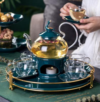 China Nordic Style Heat Resistant Iron Viable Ceramic Tray Glass Teapot Tea Set With The Glass Cups for sale