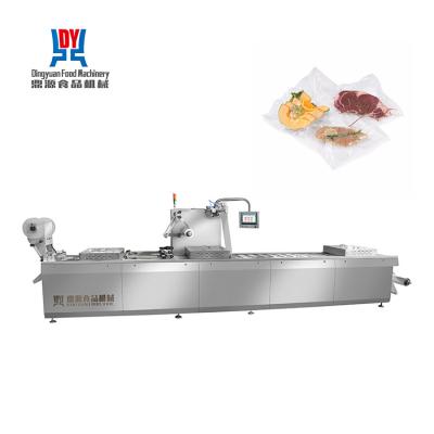 China Auto Continuous Stretch Film Vacuum Packaging Machine for sale