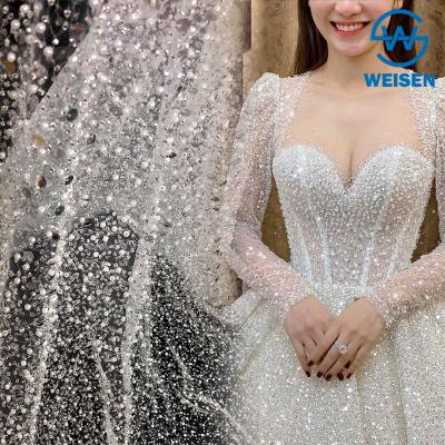 China Crystal Sequins Bridal Luxury Embroidery Viable Beads White Beaded Wedding Tulle Lace Fabric for sale