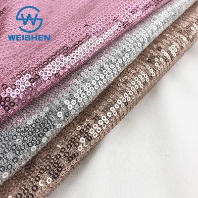 China Wholesale Memory Straight Line Mesh Shiny Sliver And Gold Embroidery Sequin Embroidered Fabric for sale