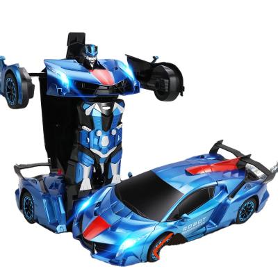 China 2.4G remote control children's toy one click to start deforming rc vehicle gesture feeling robot car remote control toys for sale