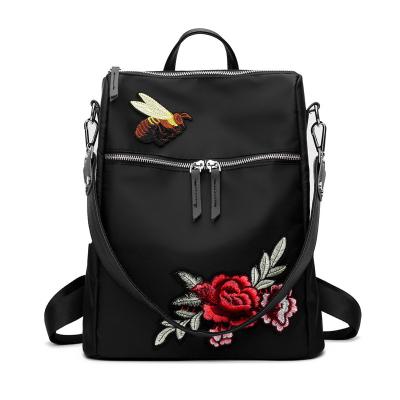 China Embroidery flower waterproof handmade women backpacks school bag for teen girls black nylon waterproof female backpacks for sale