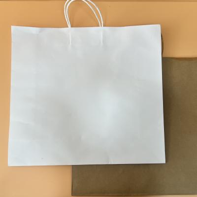 China Recyclable kraft paper or white card paper bag with handel for food and box and clothes size 44mm*14mm*40mm for sale