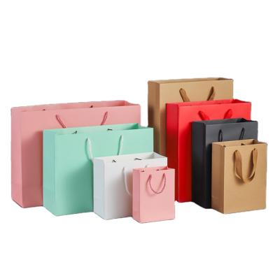 China Recyclable Paper Bag Wrapping Paper in Clothing Tote Bag Custom Packaging Tea Gift Shopping Bag Stock Wholesale for sale