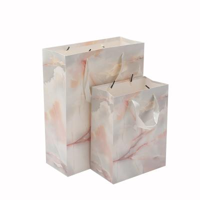 China Marble Pattern Recyclable Pink Bag Gift Shopping Apparel Card Spot White Tote Bag Paper Bag Custom for sale