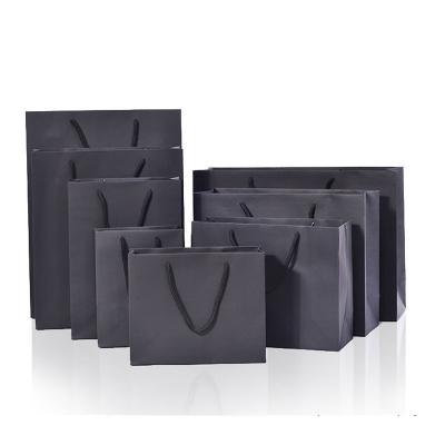 China Recyclable Manufacturers Spot Wholesale Black Cardboard Handbags High End Shopping Gift Bags Custom Logo Clothing Black Cardboard Bags for sale