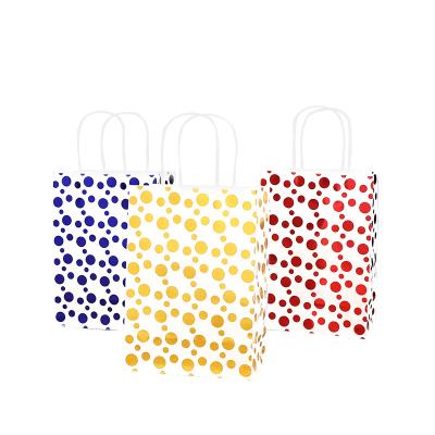 China Recyclable In Stock Kraft Bag Handle Gift Packaging Bag Clothing Shopping Tanning Paper Bag for sale