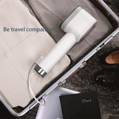 China Hotel Mini Portable Garment Steam Iron Design New SY5540 Clothes Steamer Plug Garment Steamer Travel Steam Iron for sale