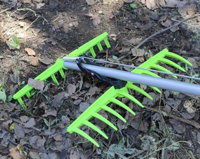 China Amazon Lightweight Hot Sales Rake Plastic Light Weight Adjustable Gather Garden Metal Grass Rake Leashes Telescopic Lawn Brush for sale