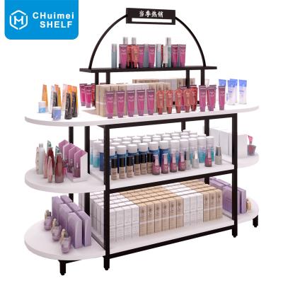 China Unique medium double-sided boutique makeup display stand Table promotion style newcomer cosmetic display rack for sale