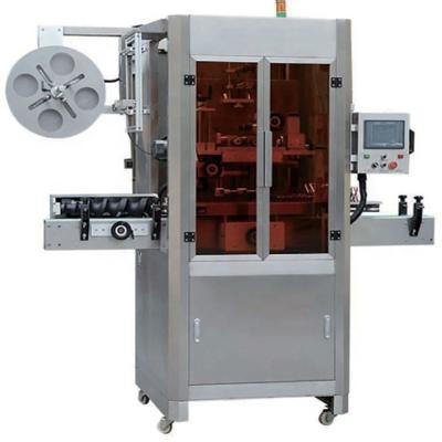 China Automatic Plastic Shrink Sleeve Cap Glass Beverage Bottle Labeling Machine for sale