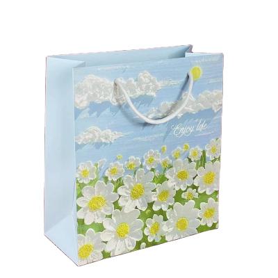 China Recycled Materials Creative oil painting style exquisite gift bag literature and art fresh gift packaging thickened paper bag with hand for sale