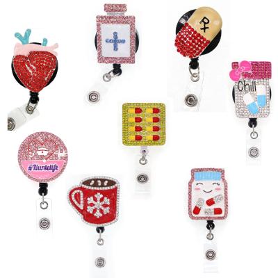 China Fashionable Creative Nurse Accessories Doctor Bottle Medical Identification Retractable Gift Rhinestone Pill. Badge reel with clip holder for sale