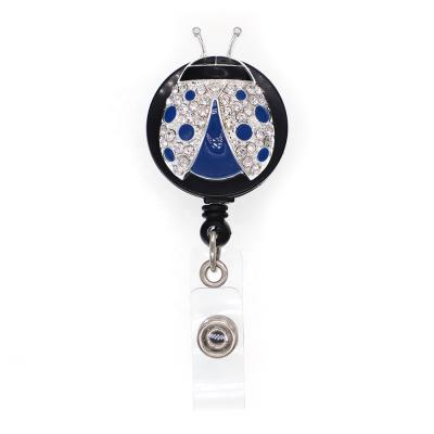 China ID Card Badge Reel Key Chain Card Tag Holding Guangzhou Zinc Alloy Blue Enamel Rhinestone Ladybug Holder Badge Nurse/Student/Office White Badge for sale