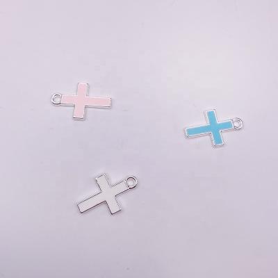 China DIY Styles Cute Pink Blue White Enamel Cross Charm Pendant For Baby Pin Jewelry Making Craft Silver Charms for sale