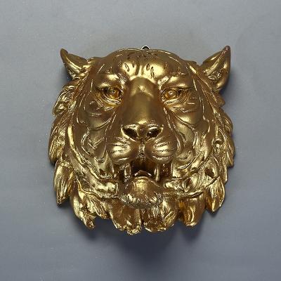 China Europe handmade modern home decoration soft gold painted resin mini lion wall decoration for sale