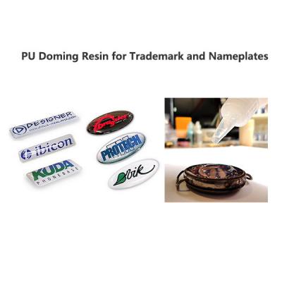 China Clear Doming Resin For Trademark And Nameplates Polyurethane Doming Resin for sale