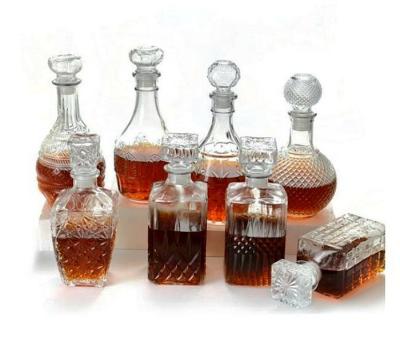 China Wholesale High Quality Clear Glass Beverage Wine Bottle Whiskey Bottle With Sealed Glass Lid for sale