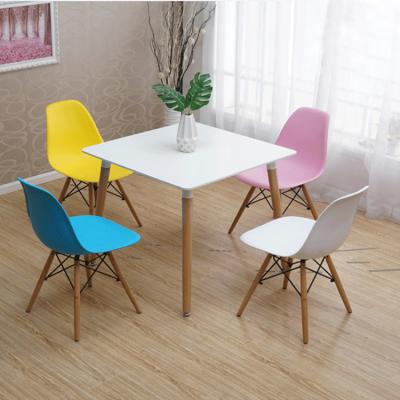 China Wholesale Cheap Modern Design Dining Room Furniture Square MDF Dining Table With Wooden Legs for sale