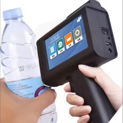 China Mini QR Date Logo Handheld Printer Gun for Bottle Glass Plastic Wood Metal in English for sale