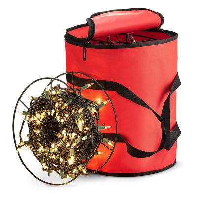 China Folding Christmas light string storage bag with three metal reels for sale